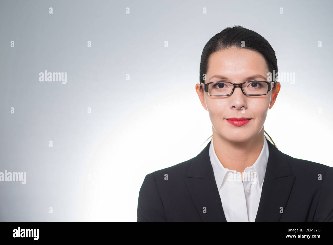 application picture of a business woman, looking into the camera with copy space Stock Photo