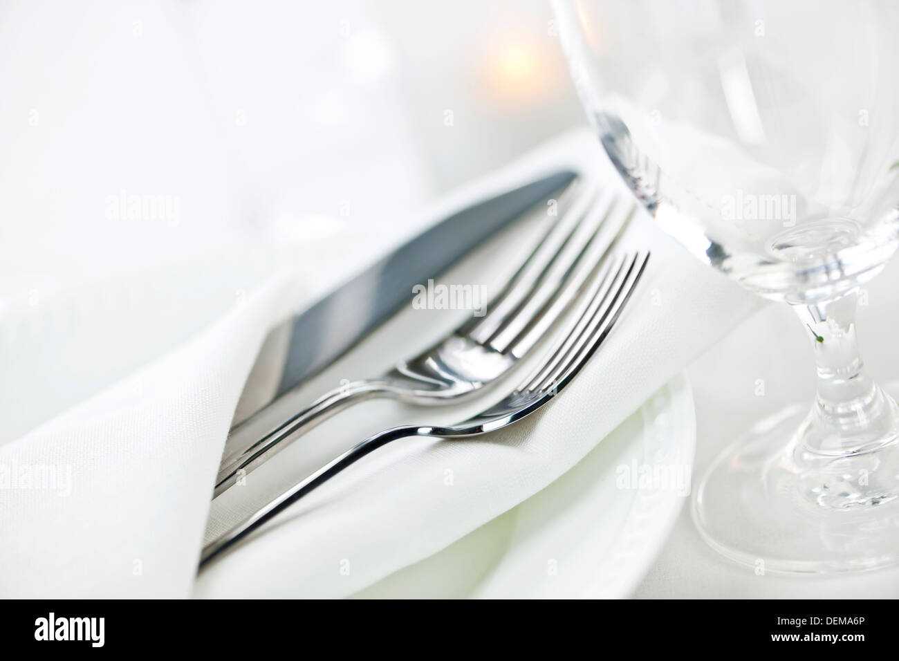 Elegant restaurant table setting for fine dining with plates cutlery ... Elegant restaurant table setting for fine dining with plates cutlery ...