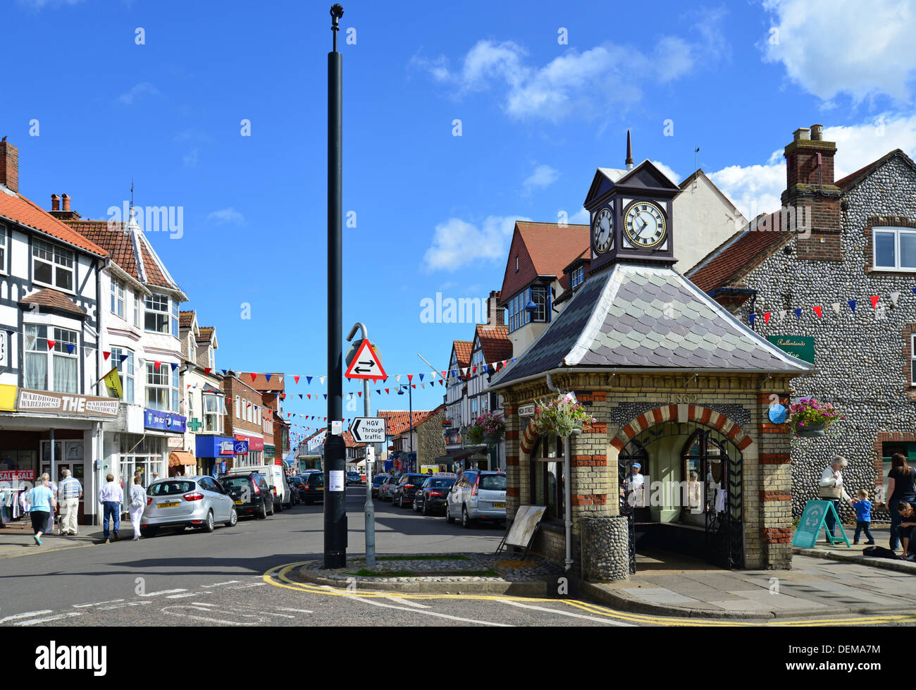 Old water pump clock tower, High Street, Sheringham, Norfolk, England