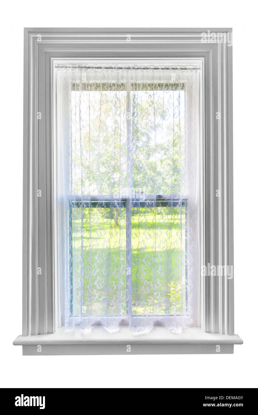 Window and sill with sheer lace curtains isolated on white background Stock Photo