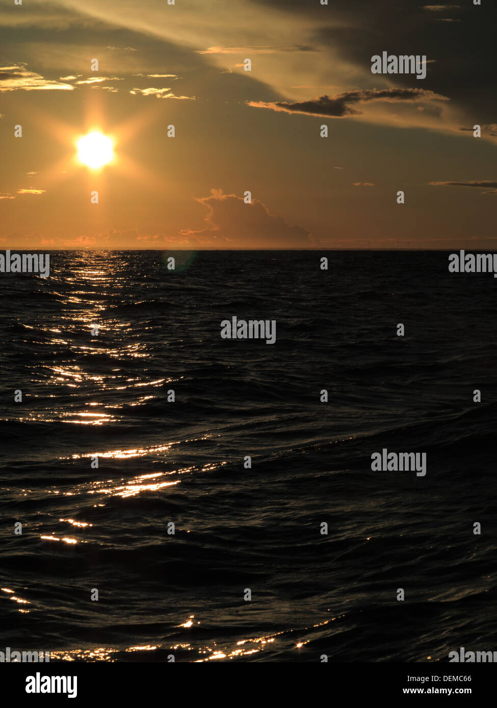 Dramatic beatiful sunset with clouds over the Baltic sea Stock Photo ...