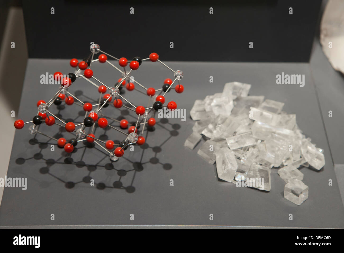 Calcite crystals and atomic structure model Stock Photo