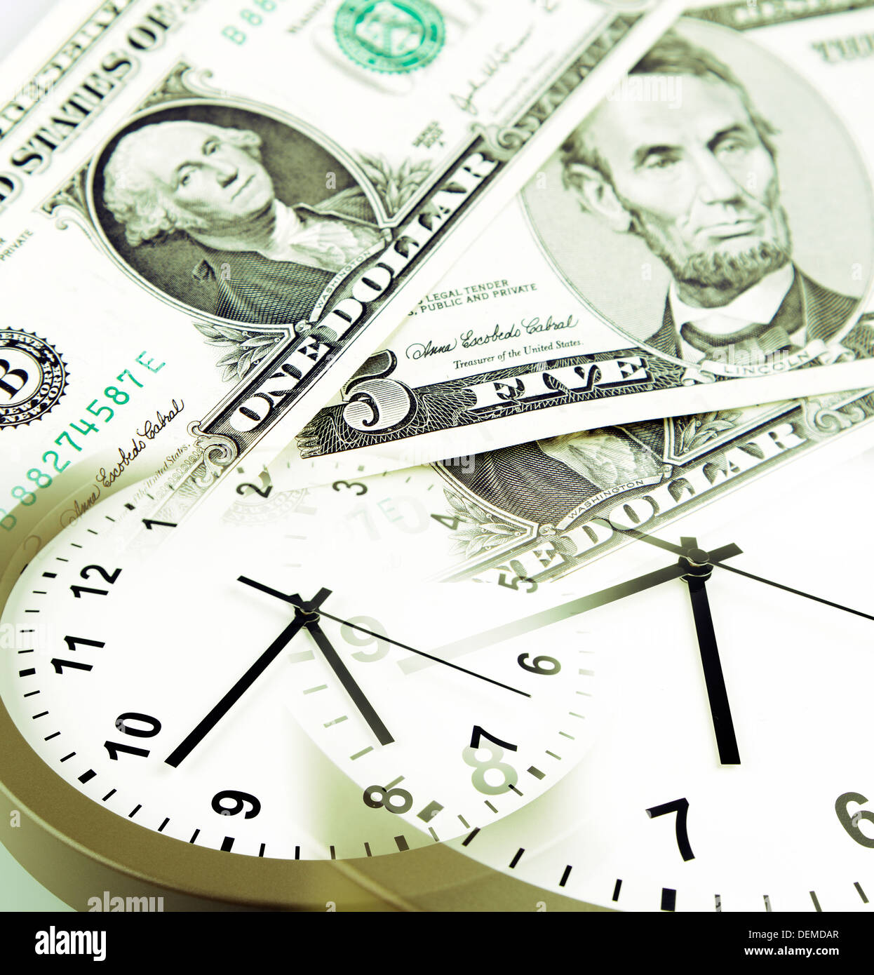 Clocks and banknotes. Time is money concept Stock Photo