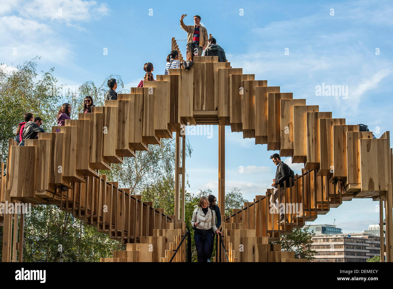 London, UK. 20th Sep, 2013. Endless Stair: commissioned for the London Design Festival, it invites visitors to climb and explore a series of 15 Escher-like interlocking staircases made from a prefabricated construction using 44 cubic metres of American tulipwood donated by AHEC members.  It was designed by Alex de Rijke, Co-Founder of dRMM Architects and Dean of Architecture at the Royal College of Art, working closely with engineers at Arup. Tulipwood is a plentiful and sustainable American hardwood export, and is being used for the first time as cross-laminated timber. © Guy Bell/Alamy Live Stock Photo