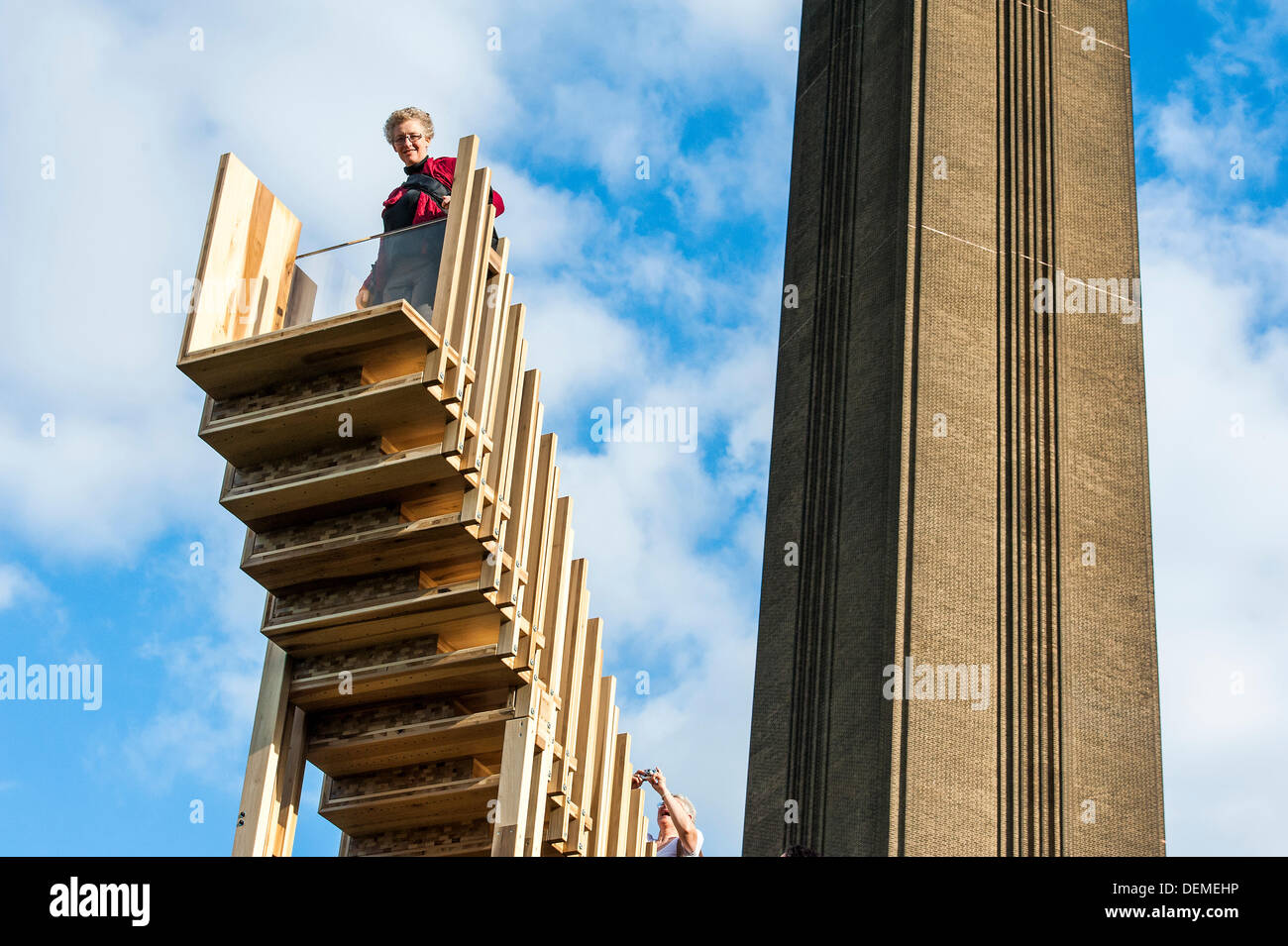 London, UK. 20th Sep, 2013. Endless Stair: commissioned for the London Design Festival, it invites visitors to climb and explore a series of 15 Escher-like interlocking staircases made from a prefabricated construction using 44 cubic metres of American tulipwood donated by AHEC members.  It was designed by Alex de Rijke, Co-Founder of dRMM Architects and Dean of Architecture at the Royal College of Art, working closely with engineers at Arup. Tulipwood is a plentiful and sustainable American hardwood export, and is being used for the first time as cross-laminated timber. © Guy Bell/Alamy Live Stock Photo