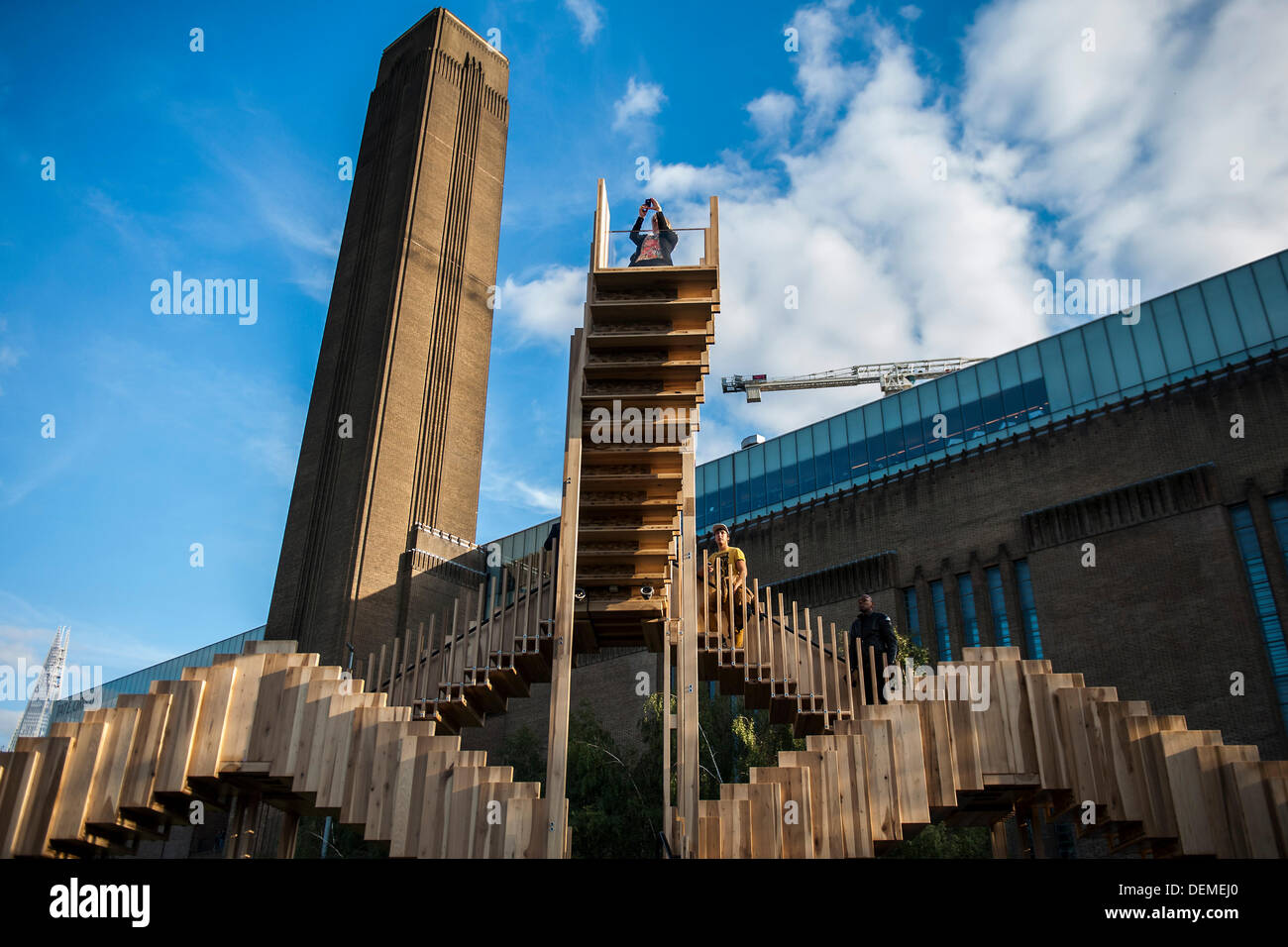 London, UK. 20th Sep, 2013. Endless Stair: commissioned for the London Design Festival, it invites visitors to climb and explore a series of 15 Escher-like interlocking staircases made from a prefabricated construction using 44 cubic metres of American tulipwood donated by AHEC members.  It was designed by Alex de Rijke, Co-Founder of dRMM Architects and Dean of Architecture at the Royal College of Art, working closely with engineers at Arup. Tulipwood is a plentiful and sustainable American hardwood export, and is being used for the first time as cross-laminated timber. © Guy Bell/Alamy Live Stock Photo