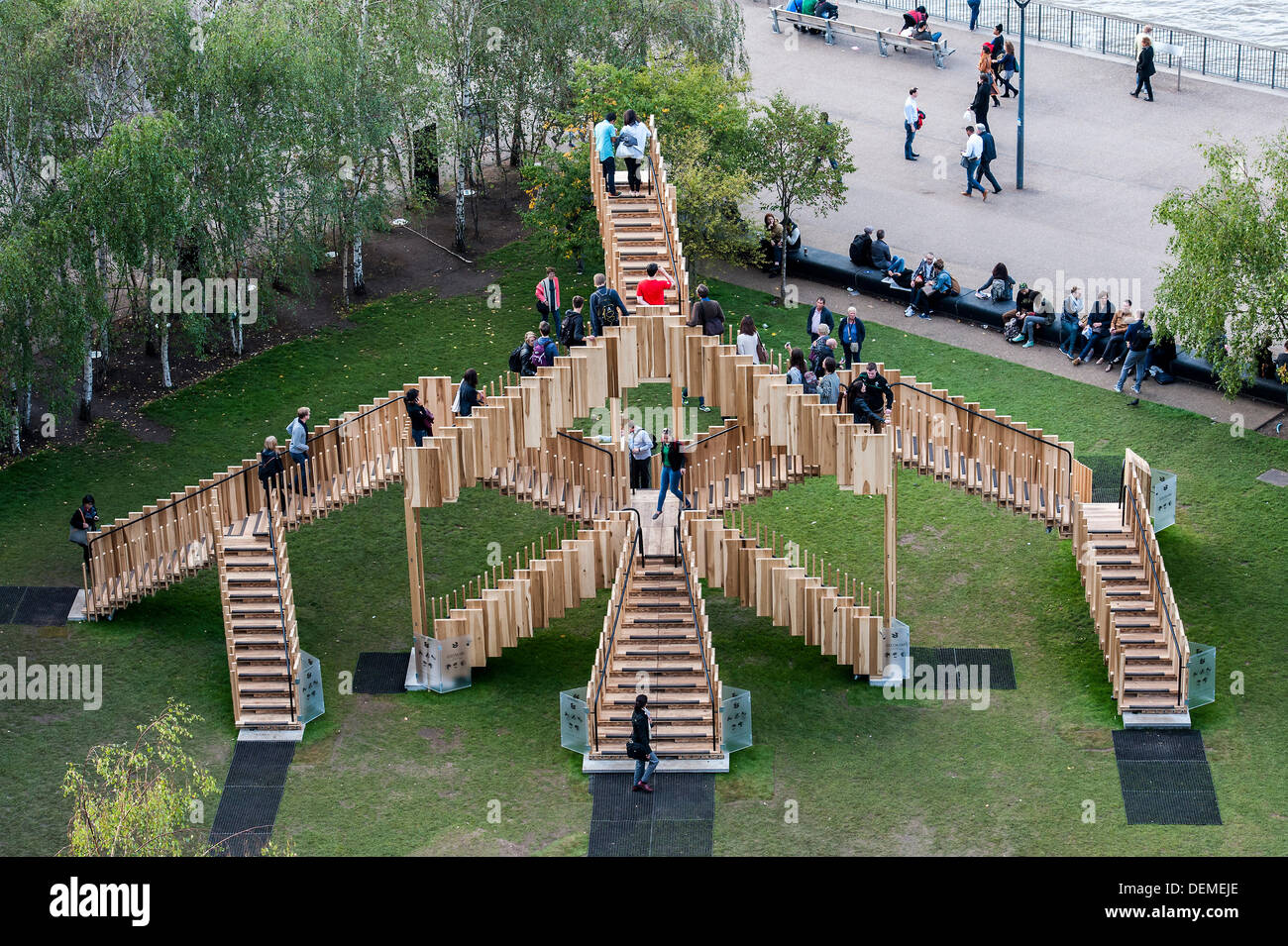 London, UK. 20th Sep, 2013. Endless Stair: commissioned for the London Design Festival, it invites visitors to climb and explore a series of 15 Escher-like interlocking staircases made from a prefabricated construction using 44 cubic metres of American tulipwood donated by AHEC members.  It was designed by Alex de Rijke, Co-Founder of dRMM Architects and Dean of Architecture at the Royal College of Art, working closely with engineers at Arup. Tulipwood is a plentiful and sustainable American hardwood export, and is being used for the first time as cross-laminated timber. © Guy Bell/Alamy Live Stock Photo