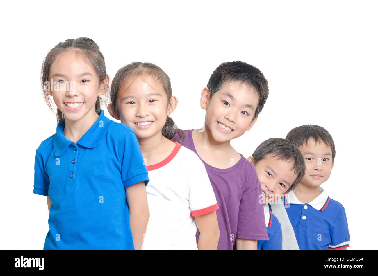 Five children smiling on white background Stock Photo