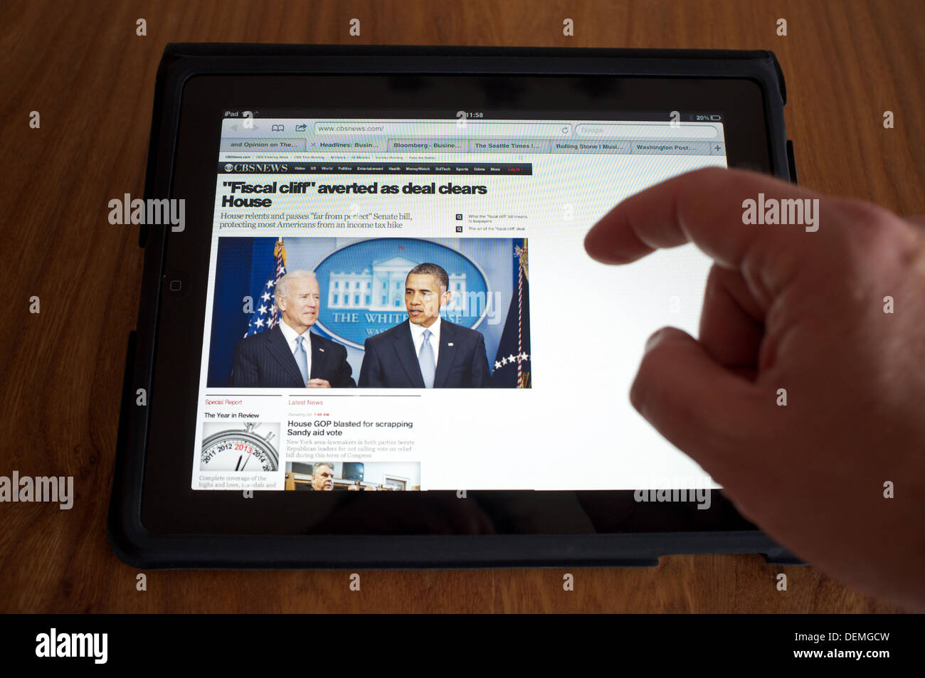 CBS news homepage displayed on an Apple iPad tablet computer Stock Photo