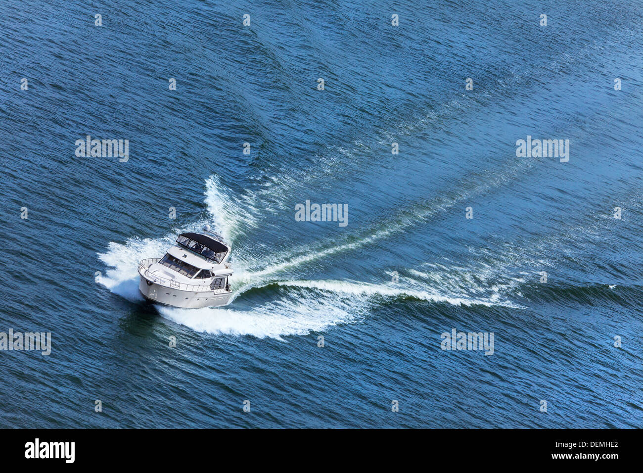 Aerial photograph of luxury power boat yacht speedboat on blue sea Stock Photo
