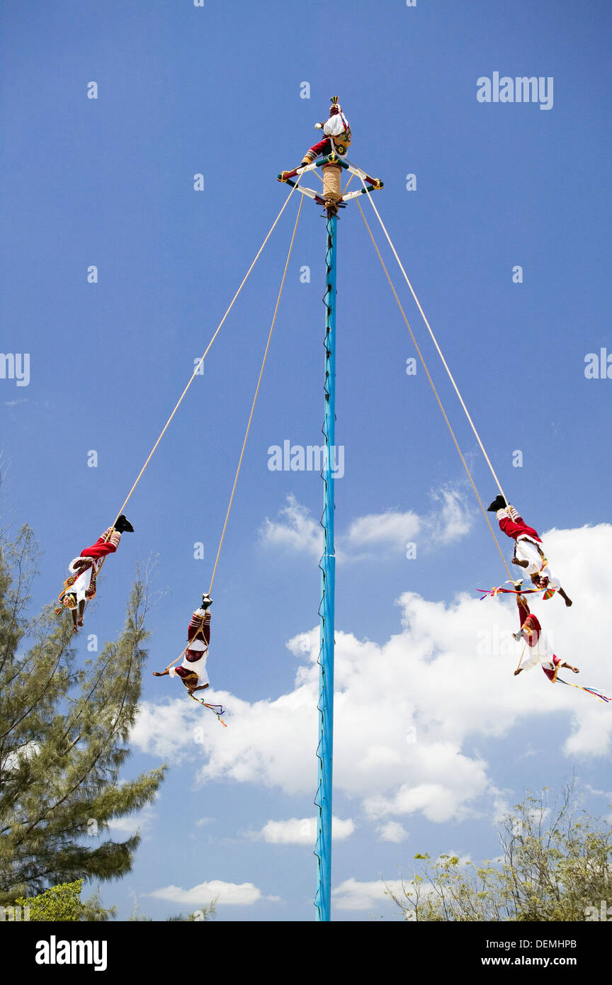 ´Voladores´ (flyers) perform Totonac Native ritual outside of Tulum. Yucatan, Mexico Stock Photo