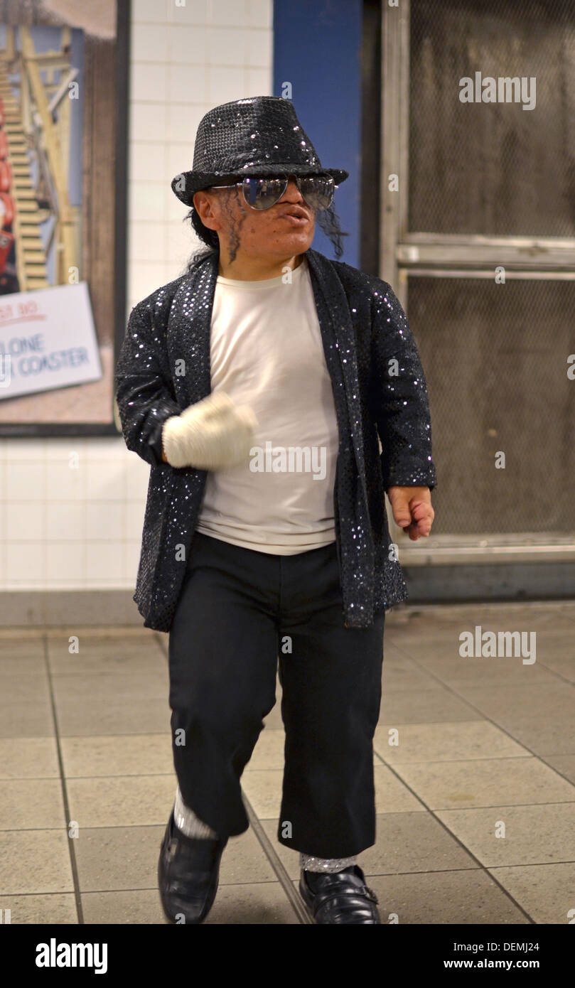 Alex, a little person Michael Jackson impersonator performs at the 74th Street Subway Station in Queens, New York Stock Photo