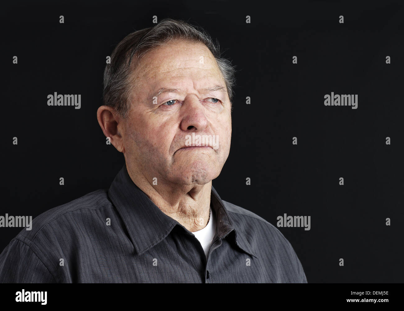 Sad, depressed or deep in thoughts senior old man Stock Photo