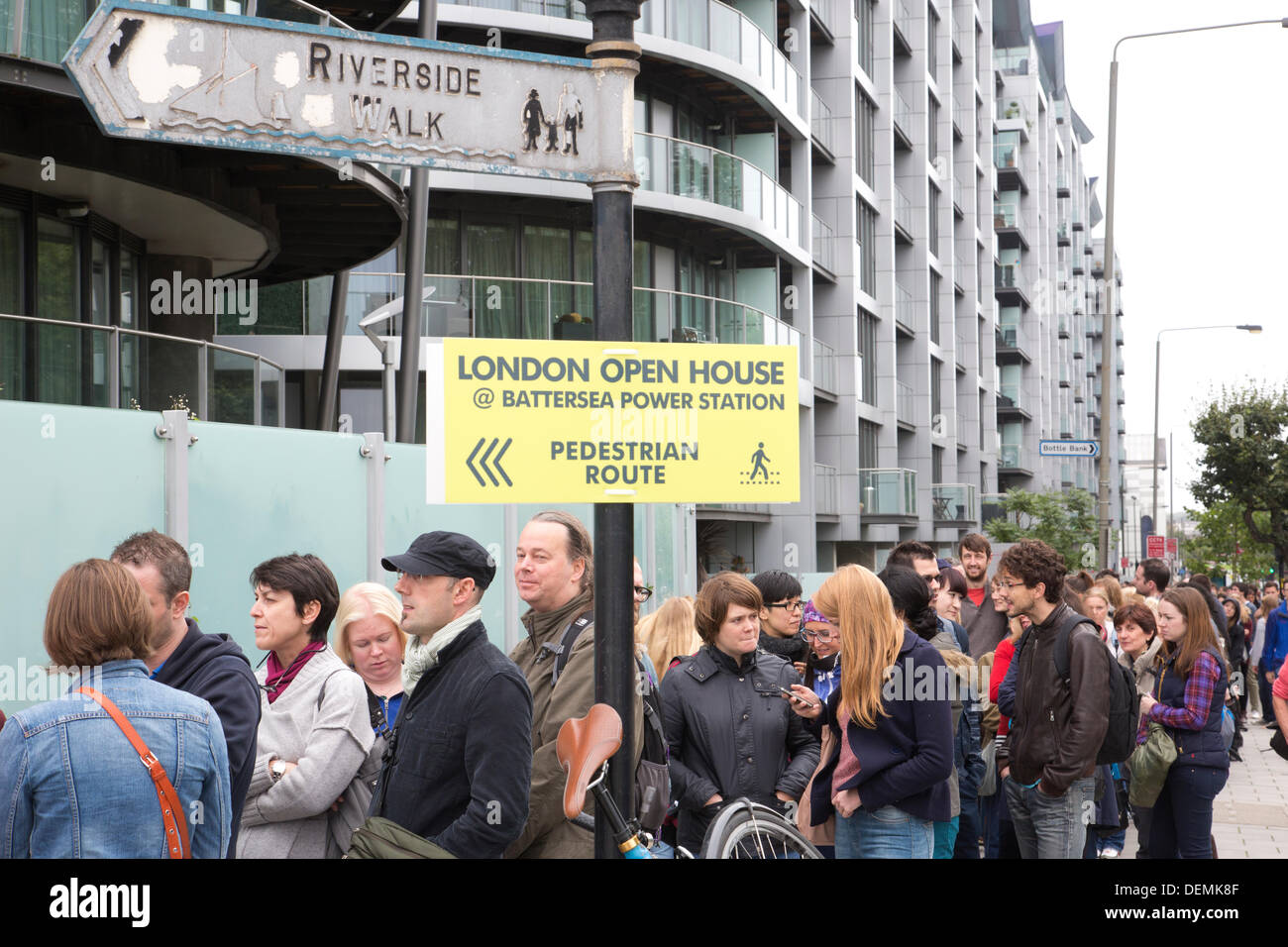 Battersea Power Station open house event, London, UK. 21st September 2013.  Picture shows hundreds of visitors queueing outside Battersea Power Station, which will be taking part in London Open House this weekend, between 11am and 4pm each day. Visitors will be able to follow a walking route around the site, starting in the 2.5 acre Pop Up Park on the riverside before leading through to what remains of the vast central Boiler House and finally exiting via the cavernous 1950’s Turbine Hall B on the eastern flank of the building. Credit:  Jeff Gilbert/Alamy Live News Stock Photo