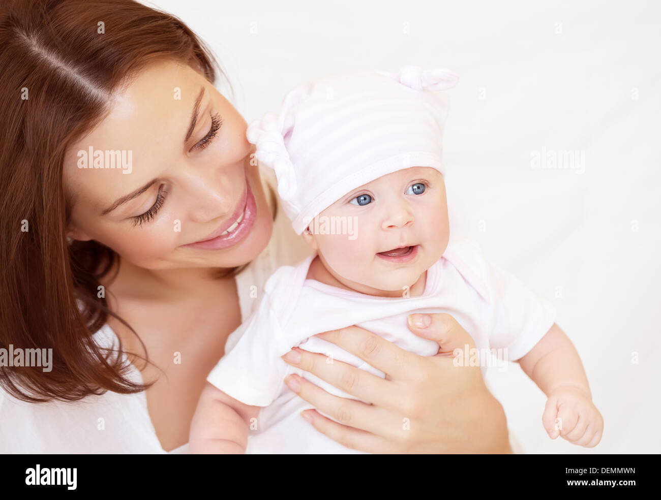 Closeup Portrait Of Mother Looking On Her Cute Toddler Happy Baby