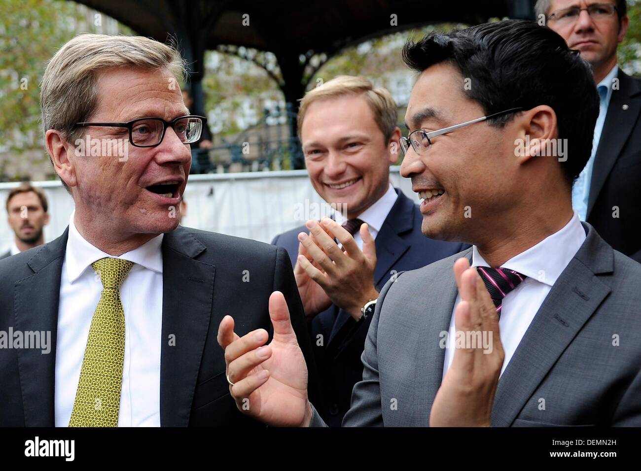 Duesseldorf, Germany. 21st Sep, 2013. Federal Foreign Minister Guido Westerwelle (L), chairman of North Rhine-Westphalia (C) Christian Lindner and Federal chairman Philipp Roesler (R), all members of the Free Democratic Party (FDP) stand together at the nationwide closing rally of the FDP in Duesseldorf, Germany, 21 September 2013. Photo: MARIUS BECKER/dpa/Alamy Live News Stock Photo