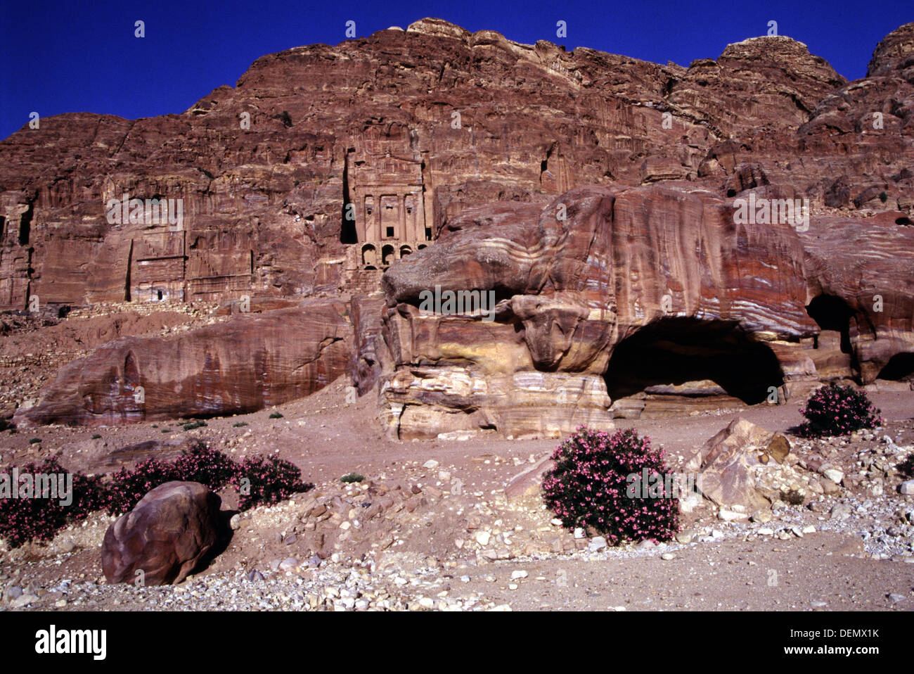 Ancient Nabatean rock cut monument facades carved into Jabal al-Khubtha ...
