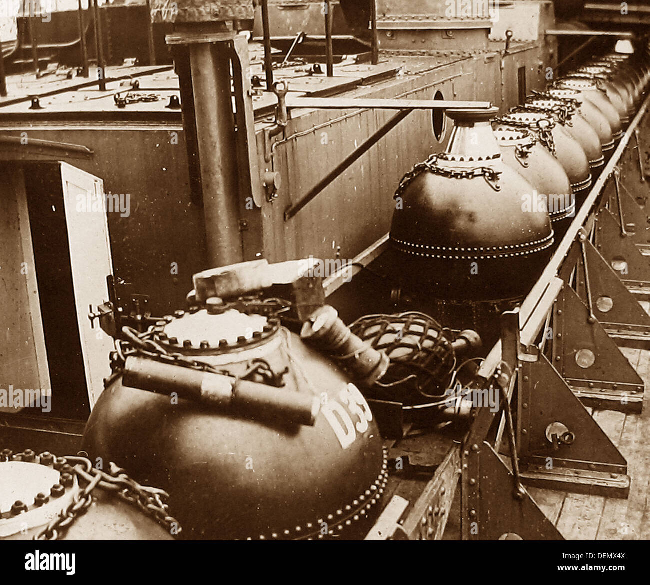 Royal Navy mines on board ship probably 1930s Stock Photo