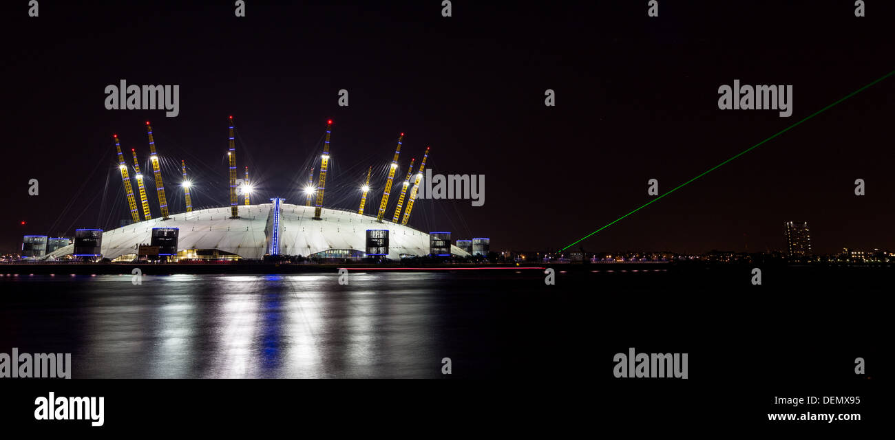 LONDON - CIRCA 2013: O2 Arena during the night and the Greenwich meridian behind Stock Photo
