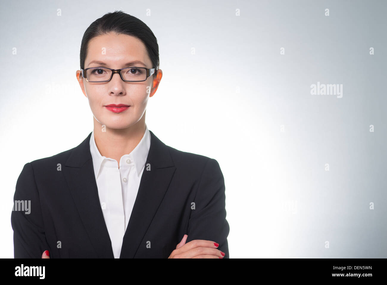 application picture of a business woman, looking into the camera with copy space Stock Photo