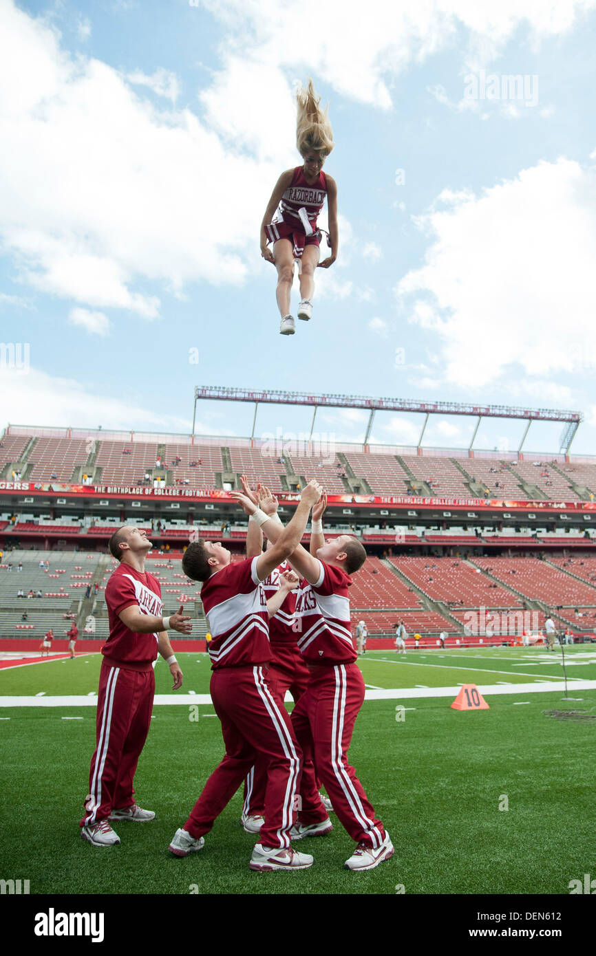 Piscataway, New Jersey, USA. 21st Sep, 2013. September 21, 2013: The Arkansas Razorbacks cheerleaders flip a girl upside down during the game between Arkansas Razorbacks and Rutgers Scarlet Knights at Highpoint Solutions Stadium in Piscataway, NJ. Rutgers Scarlet Knights defeated The Arkansas Razorbacks 28-24. Credit:  csm/Alamy Live News Stock Photo