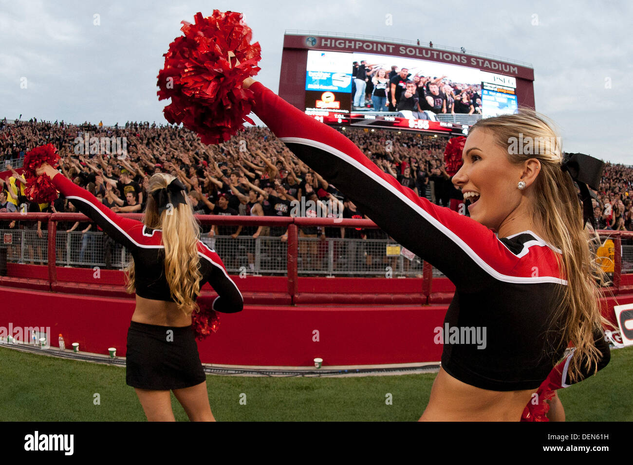 Piscataway, New Jersey, USA. 21st Sep, 2013. September 21, 2013: The Rutgers Scarlet Knights cheerleaders get the crowd involved during the game between Arkansas Razorbacks and Rutgers Scarlet Knights at Highpoint Solutions Stadium in Piscataway, NJ. Rutgers Scarlet Knights defeated The Arkansas Razorbacks 28-24. Credit:  csm/Alamy Live News Stock Photo