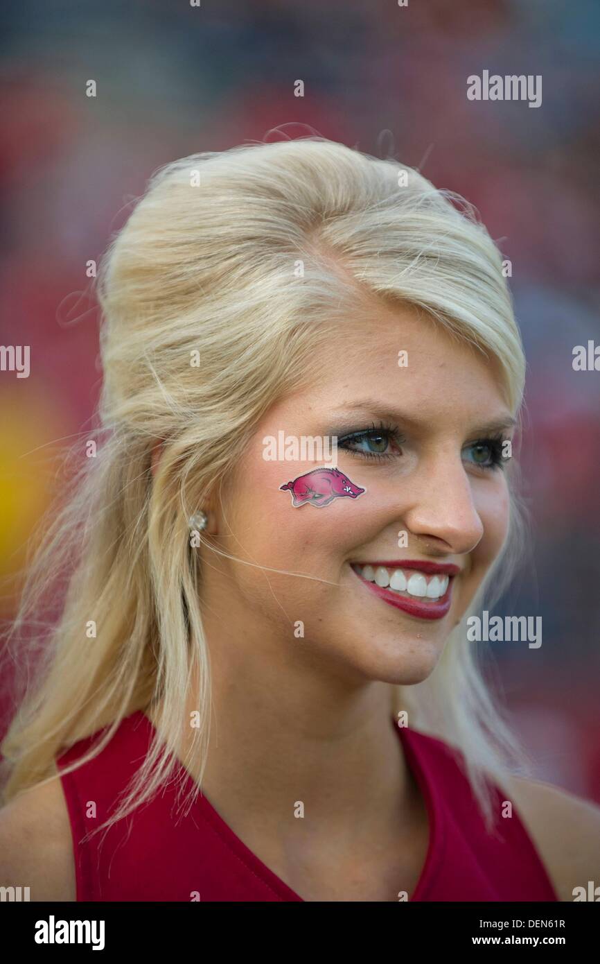 Piscataway, New Jersey, USA. 21st Sep, 2013. September 21, 2013: A Arkansas Razorbacks cheerleader has a hog sticker under her eye during the game between Arkansas Razorbacks and Rutgers Scarlet Knights at Highpoint Solutions Stadium in Piscataway, NJ. Rutgers Scarlet Knights defeated The Arkansas Razorbacks 28-24. Credit:  csm/Alamy Live News Stock Photo