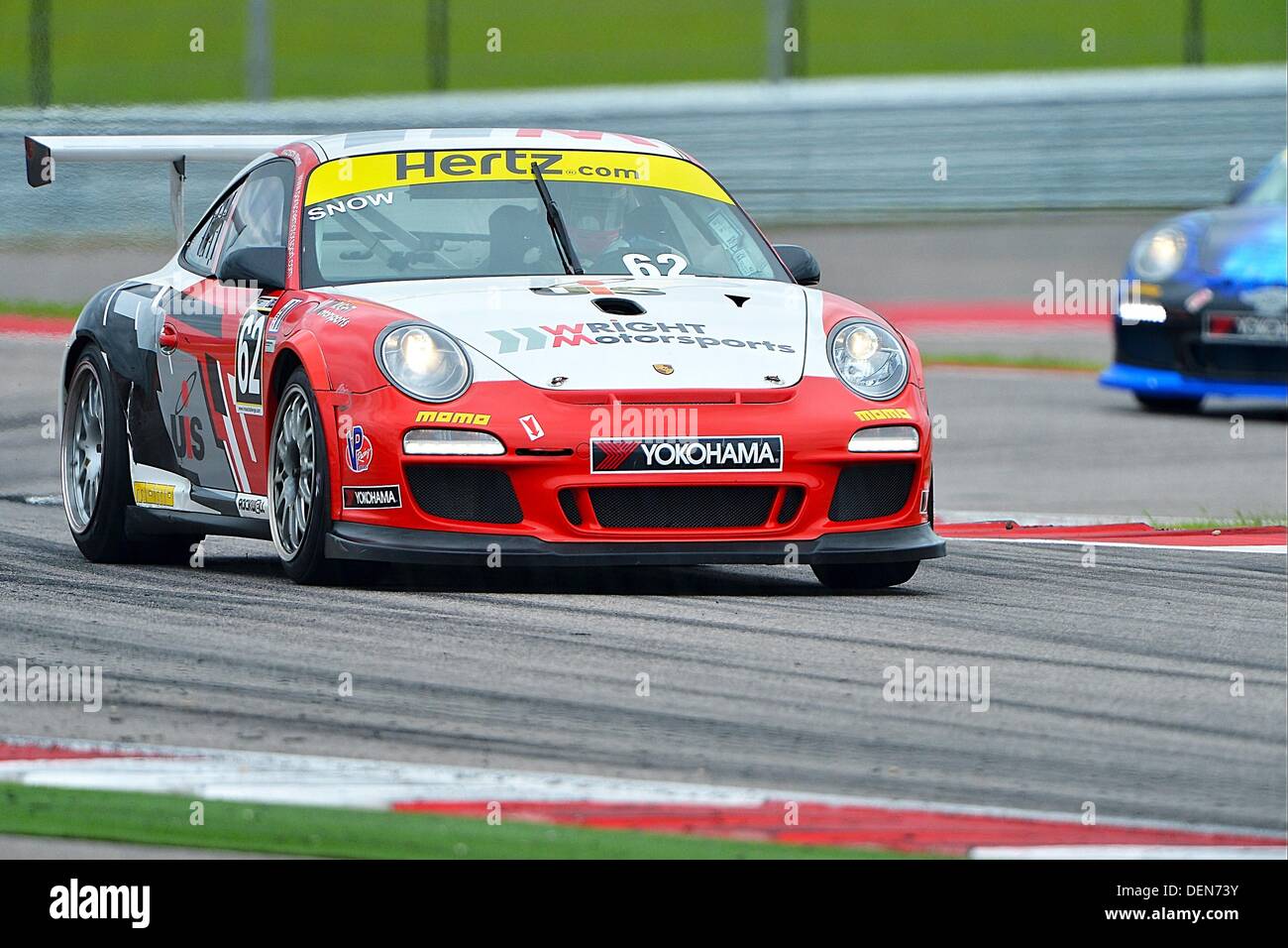 Austin, TX, USA. 21st Sep, 2013. September 21, 2013 .Madison Snow / Lehi, UT of Snow Racing / Wright Motorsports driving Porsche 997, 2012 leads IMSA GT3 Cup Challenge Race 2 at the International Sports Car Weekend in Austin, TX. Credit:  csm/Alamy Live News Stock Photo