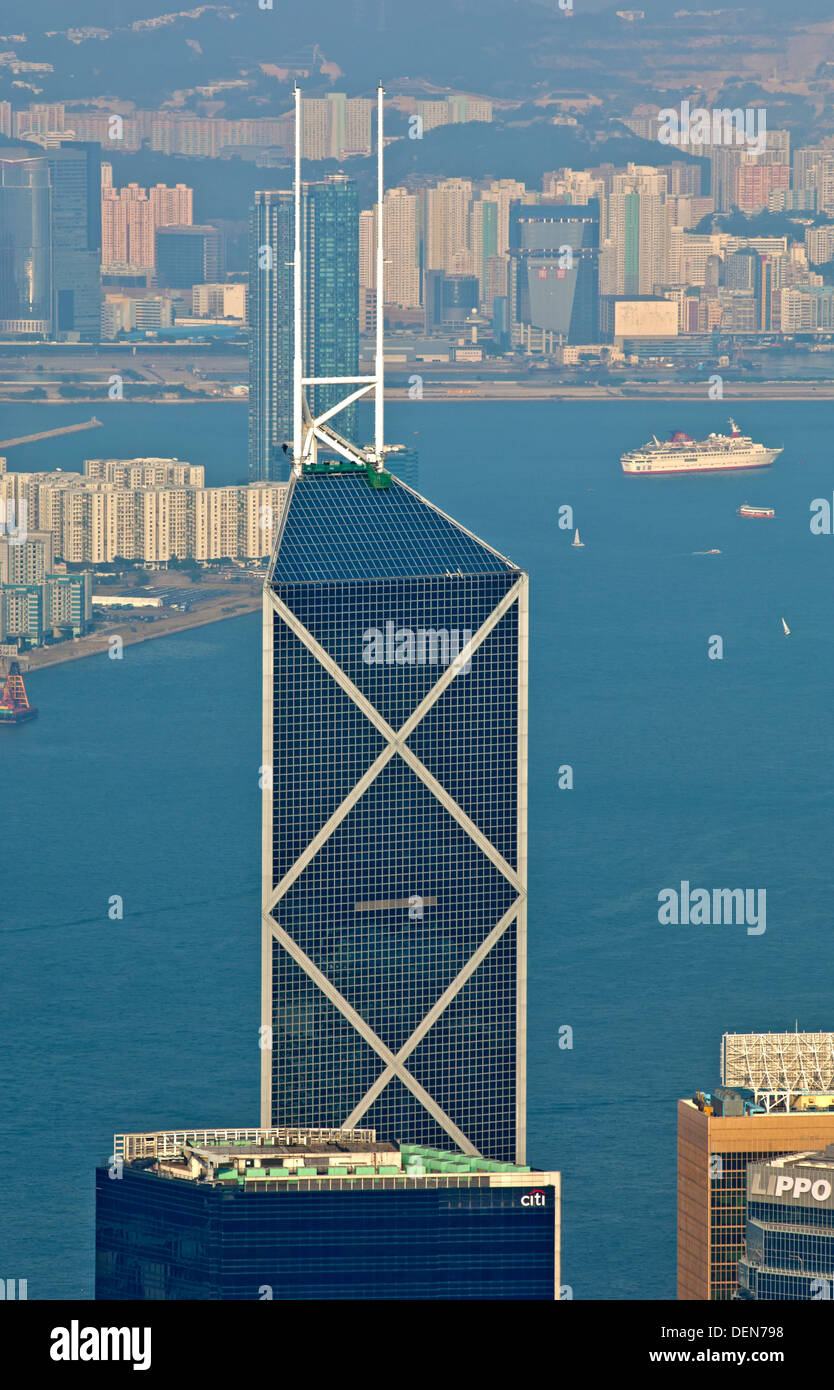 Bank of China Tower in the Central District rising above Victoria Harbour, Hong Kong Stock Photo