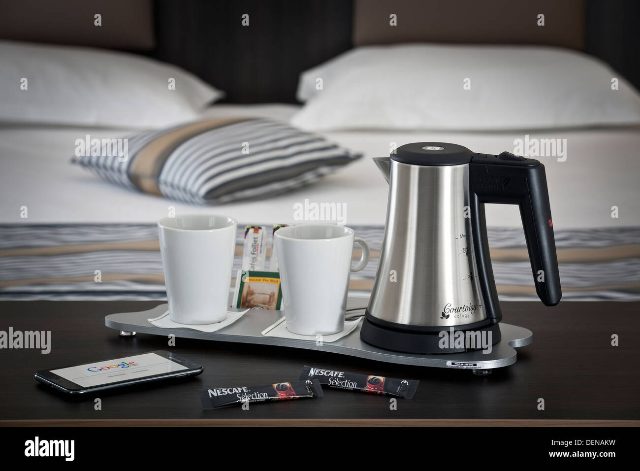 A courtesy tray in a hotel room (France).  Tea and coffee making facilities in a hotel room. Hospitality tray. Stock Photo