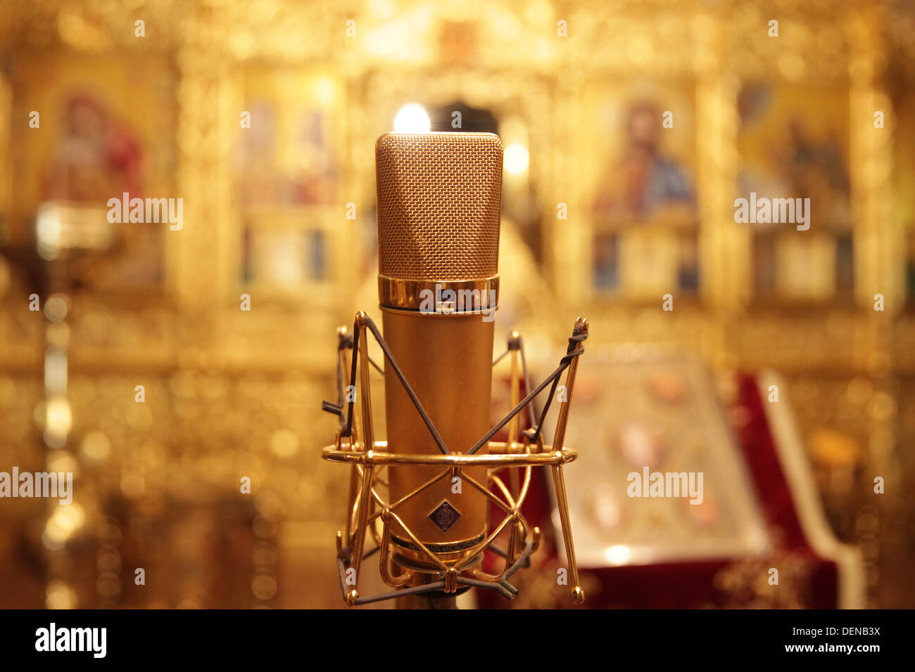 a golden microphone inside a church Stock Photo Alamy