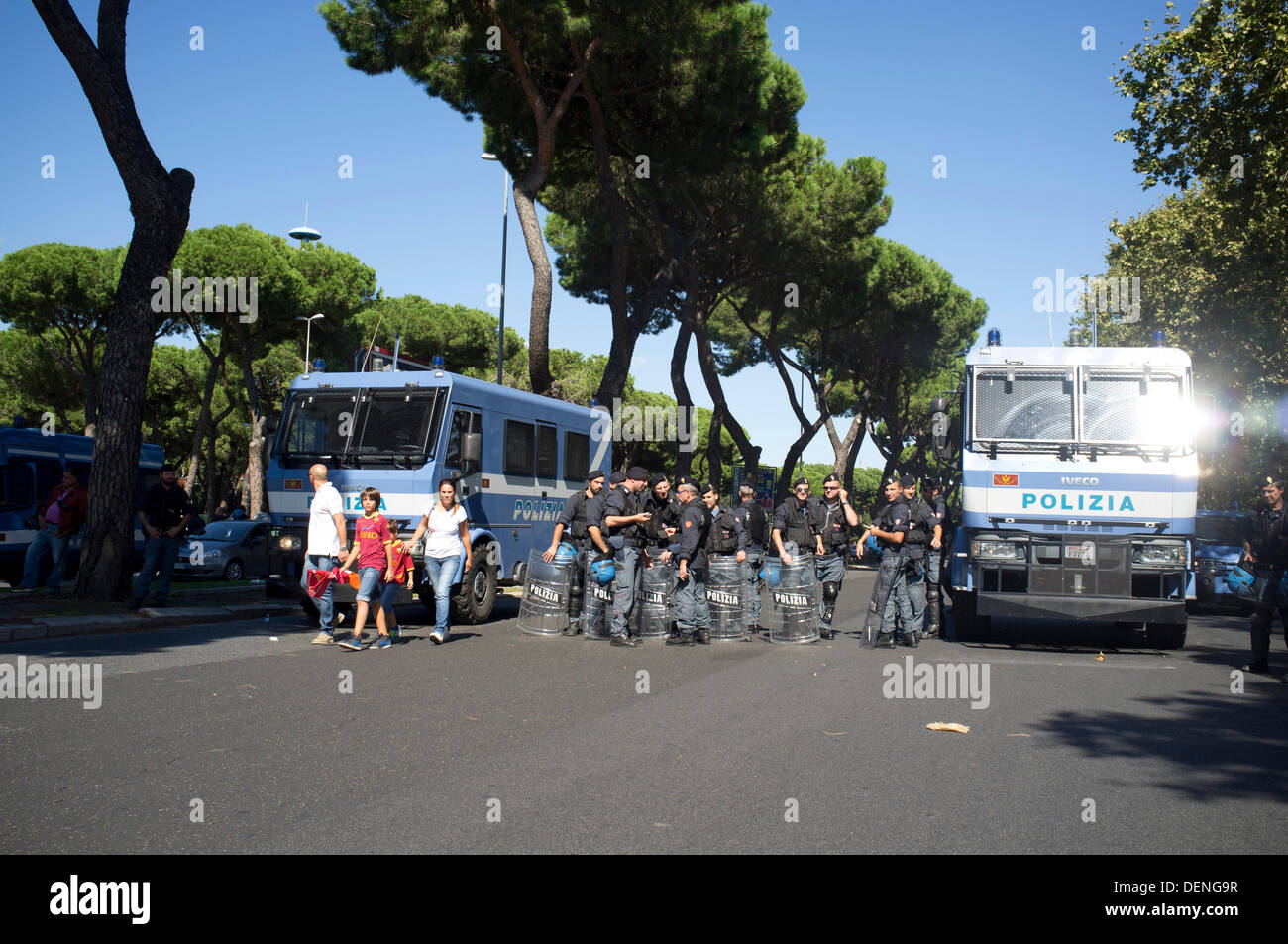 Rome Italy. 22nd Sep, 2013. A large police presence as fans start to gather for the local derby match at the olympic stadium in Rome between AS Roma and Lazio football clubs which is traditionally one the fiercest sporting rivalries in Italian football Credit:  amer ghazzal/Alamy Live News Stock Photo