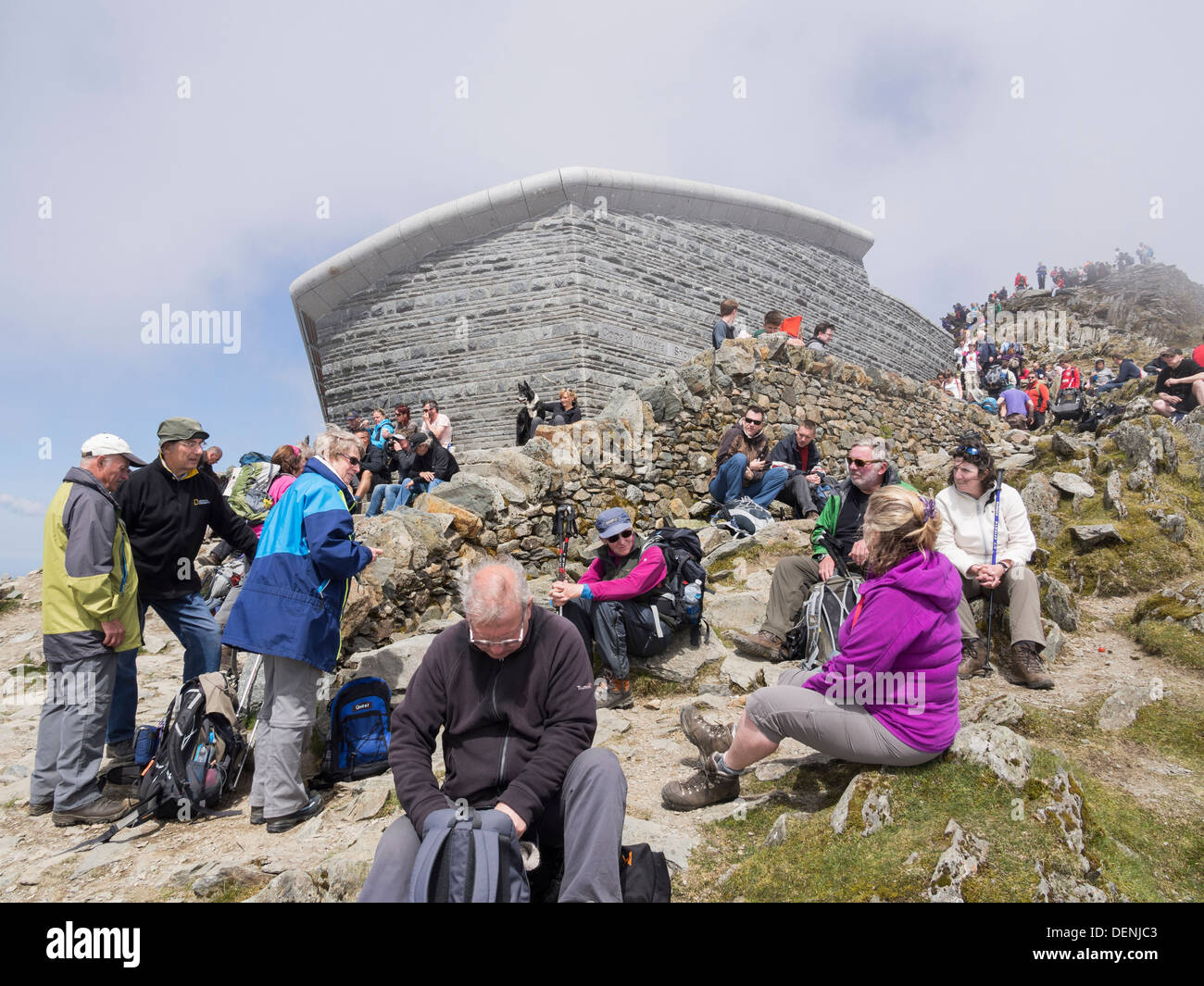 A crowd of people outside Mt Snowdon summit café Hafod Eryri on a busy summer bank holiday weekend in Snowdonia North Wales UK Stock Photo