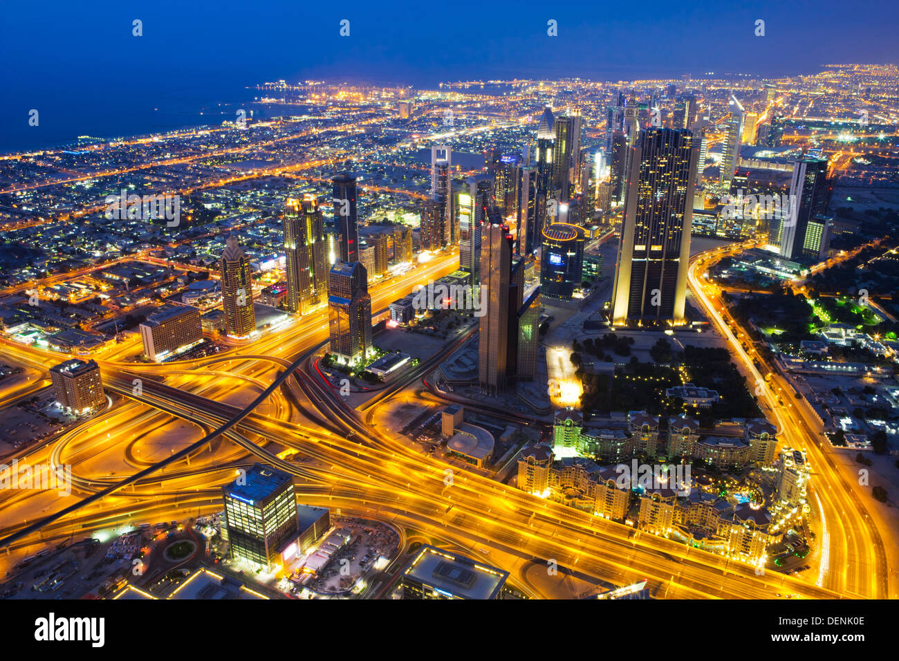 Dubai Financial centre at dusk viewed from the top of Burj Khalifa in Dubai, UAE. Stock Photo