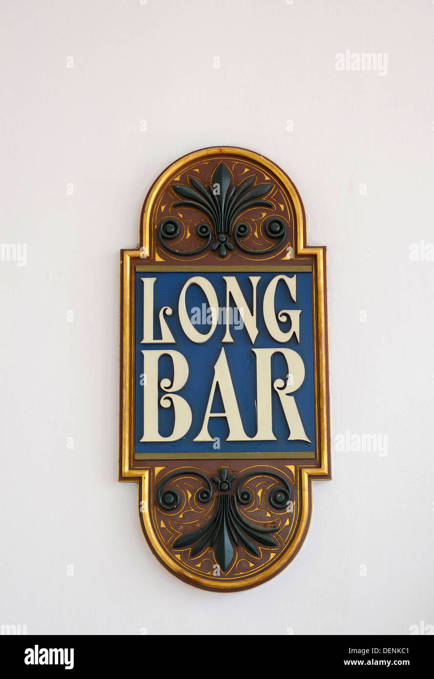 The Long Bar plaque on the wall outside the Raffles hotel in Singapore. Stock Photo