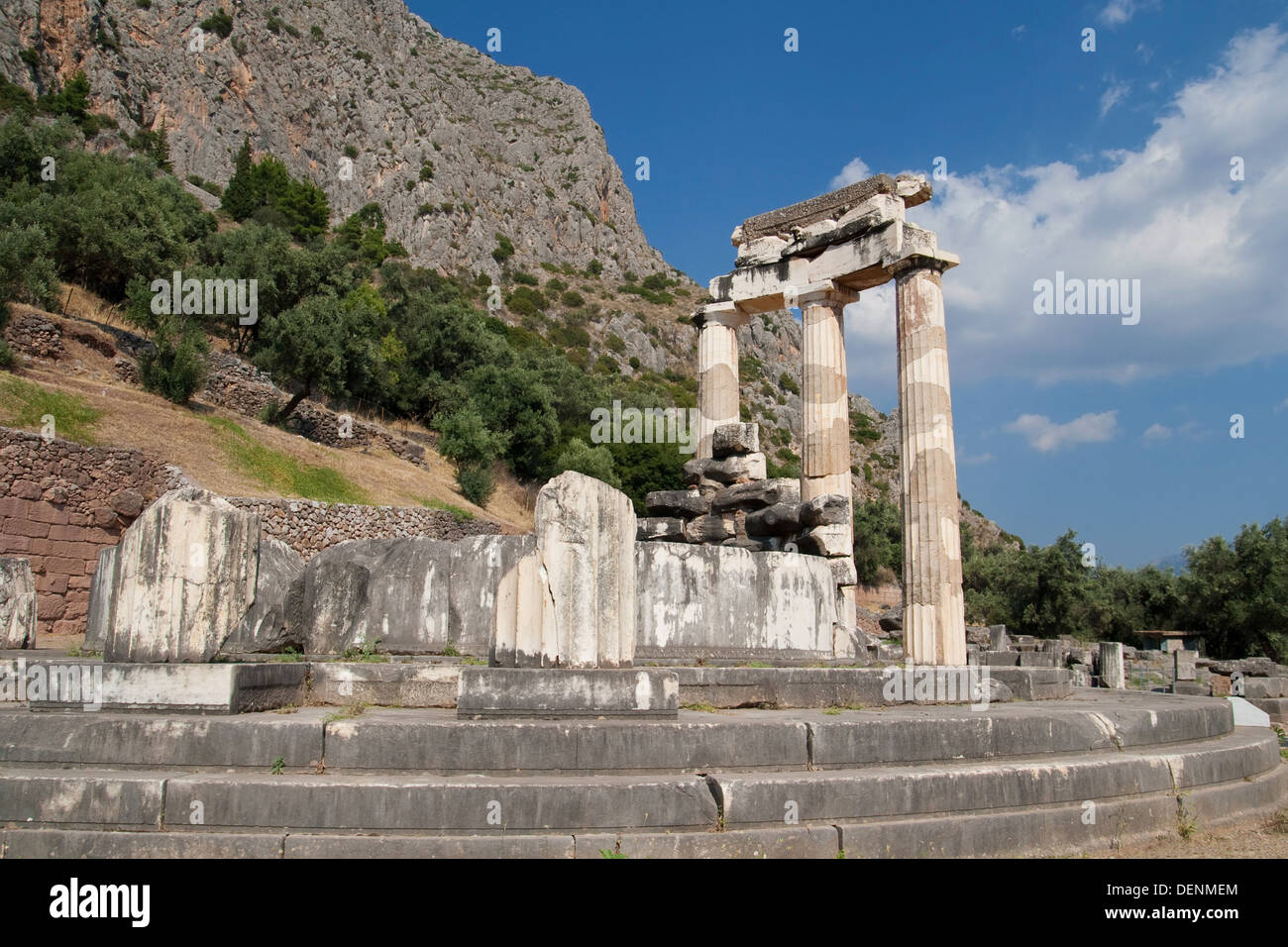 Three standing doric columns in the Sanctuary of Athena Pronaia in Delphi, Greece. Stock Photo