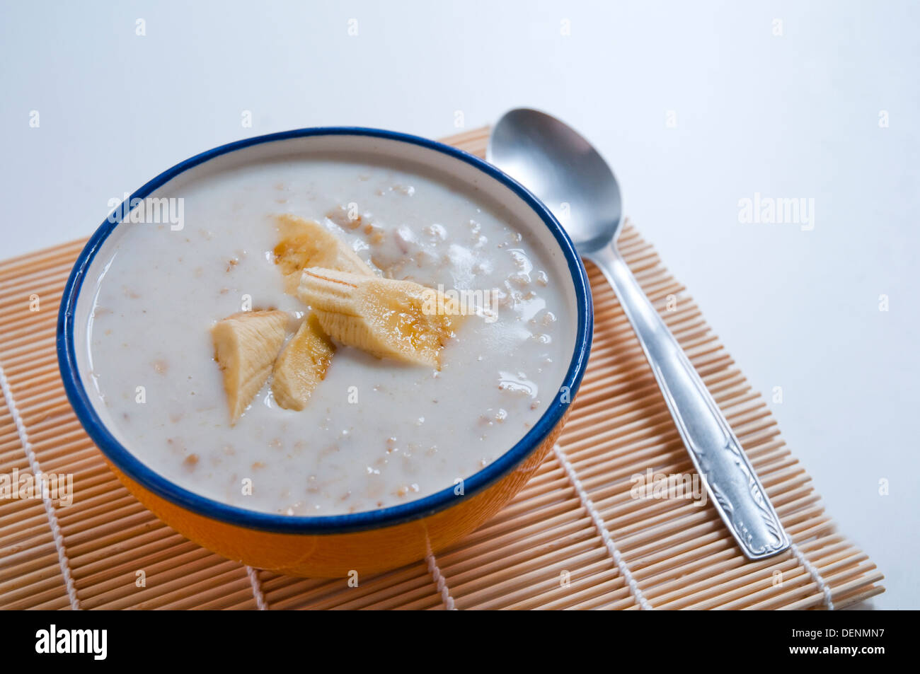 Porridge with sliced banana. Stock Photo