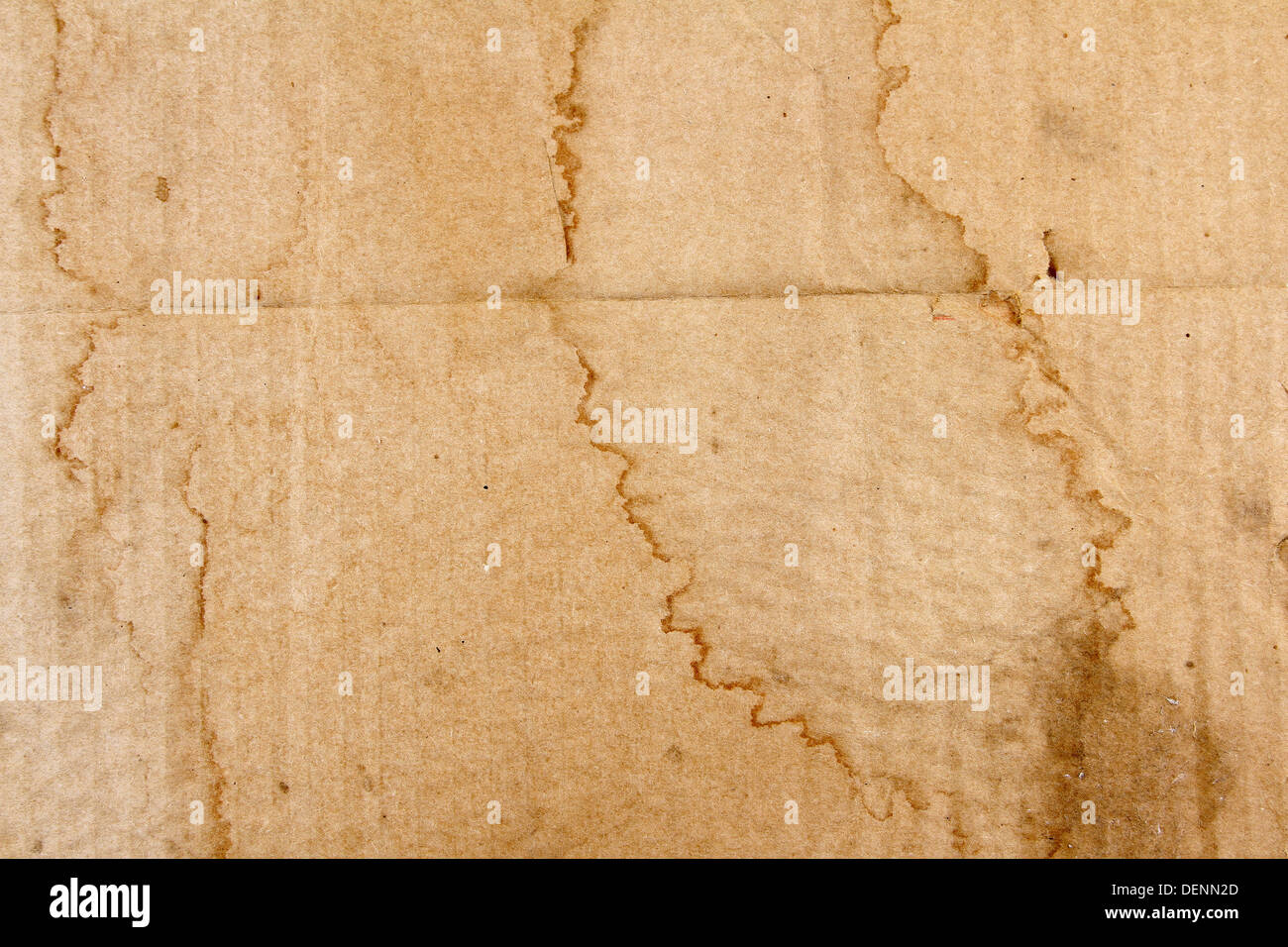 Grungy brown stained paper background Stock Photo