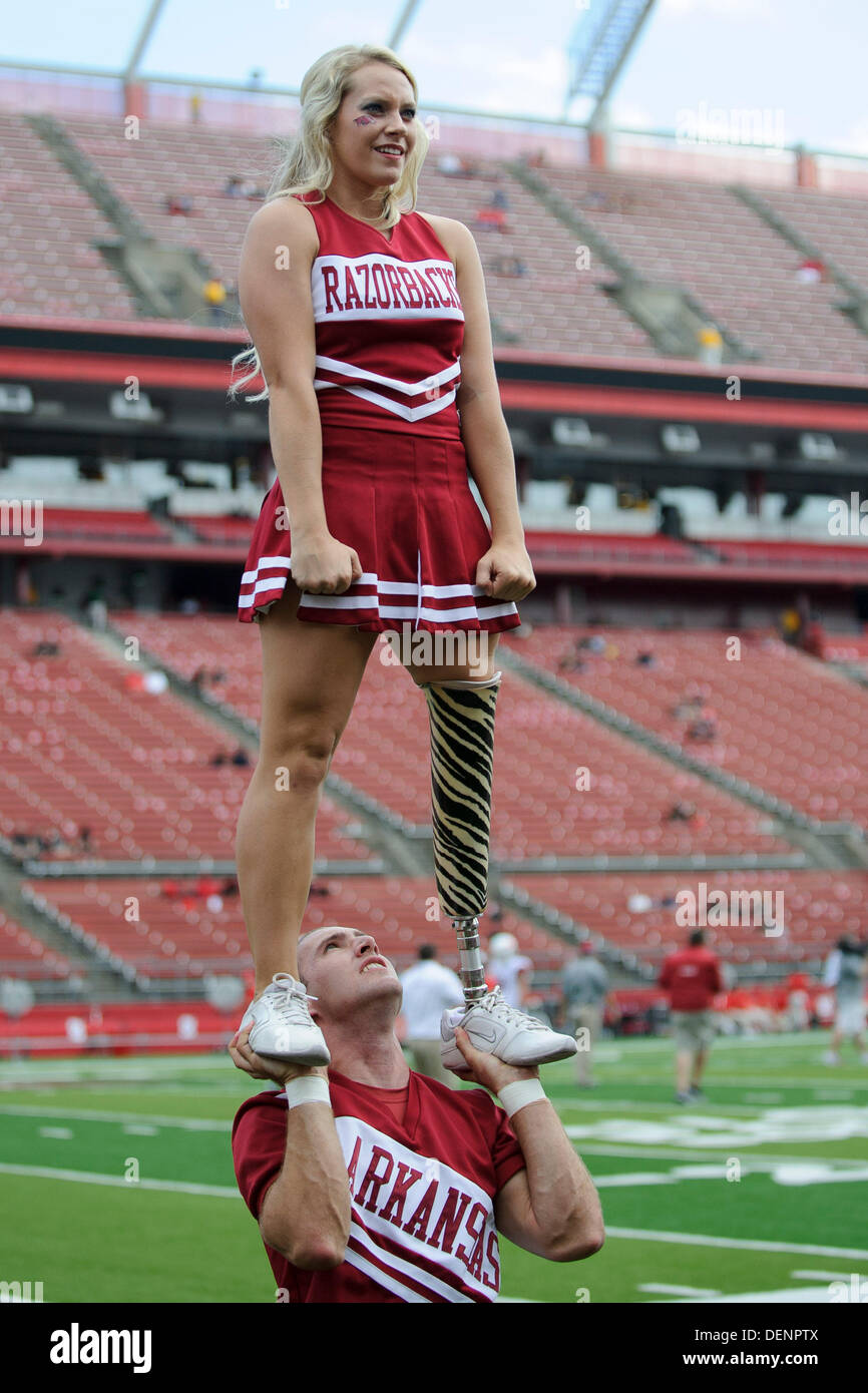 Piscataway, New Jersey, USA. 21st Sep, 2013. September 21, 2013: The Arkansas Razorbacks cheerleaders perform a feature an amputee during the game between Arkansas Razorbacks and Rutgers Scarlet Knights at Highpoint Solutions Stadium in Piscataway, NJ. Rutgers Scarlet Knights defeated The Arkansas Razorbacks 28-24. © csm/Alamy Live News Stock Photo