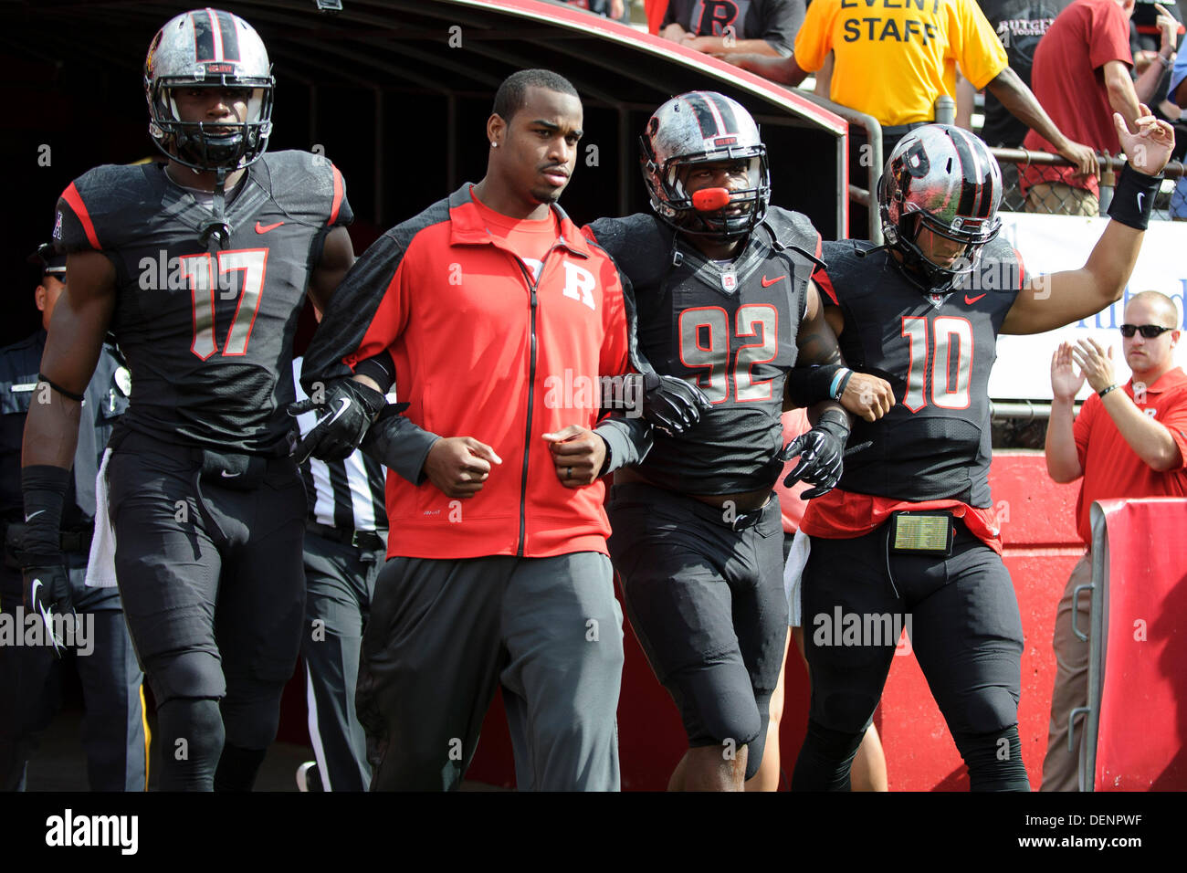 Piscataway, New Jersey, USA. 21st Sep, 2013. September 21, 2013: Rutgers Scarlet Knights quarterback Gary Nova (10), Rutgers Scarlet Knights defensive lineman Jamil Merrell (92), and Rutgers Scarlet Knights wide receiver Brandon Coleman (17) enter the field during the game between Arkansas Razorbacks and Rutgers Scarlet Knights at Highpoint Solutions Stadium in Piscataway, NJ. Rutgers Scarlet Knights defeated The Arkansas Razorbacks 28-24. © csm/Alamy Live News Stock Photo