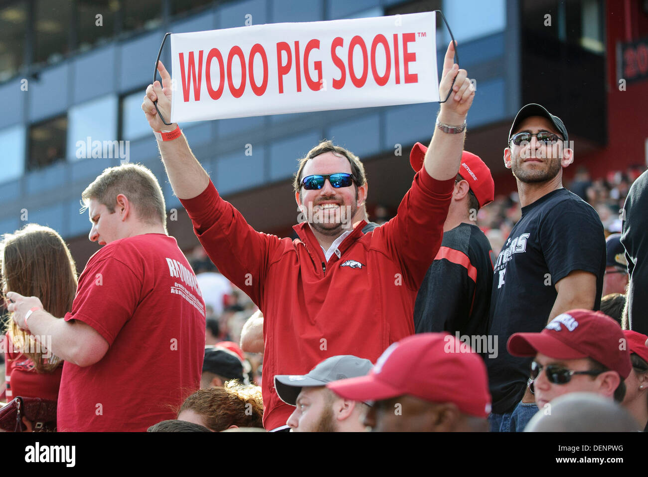 Piscataway, New Jersey, USA. 21st Sep, 2013. September 21, 2013: An Arkansas Razorbacks super fan holds up a wooo pig sooie sign during the game between Arkansas Razorbacks and Rutgers Scarlet Knights at Highpoint Solutions Stadium in Piscataway, NJ. Rutgers Scarlet Knights defeated The Arkansas Razorbacks 28-24. © csm/Alamy Live News Stock Photo