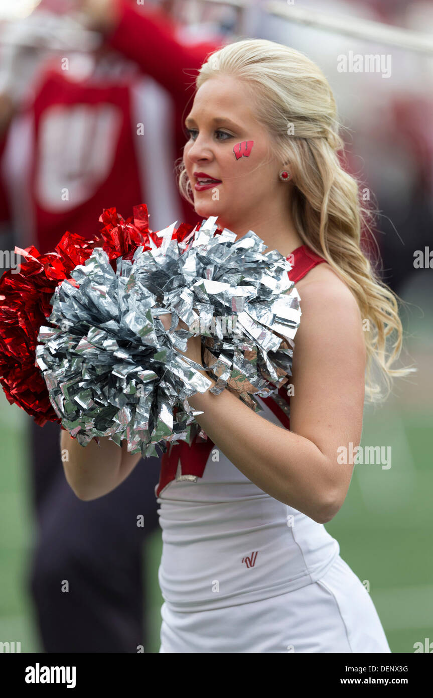 Madison, Wisconsin, USA. 21st Sep, 2013. September 21, 2013: A Wisconsin Badgers Cheerleader entertains the crowd during the NCAA Football game between the Purdue Boilermakers and the Wisconsin Badgers at Camp Randall Stadium in Madison, WI. Wisconsin defeated Purdue 41-10 in the Big Ten opener for both teams. John Fisher/CSM/Alamy Live News Stock Photo