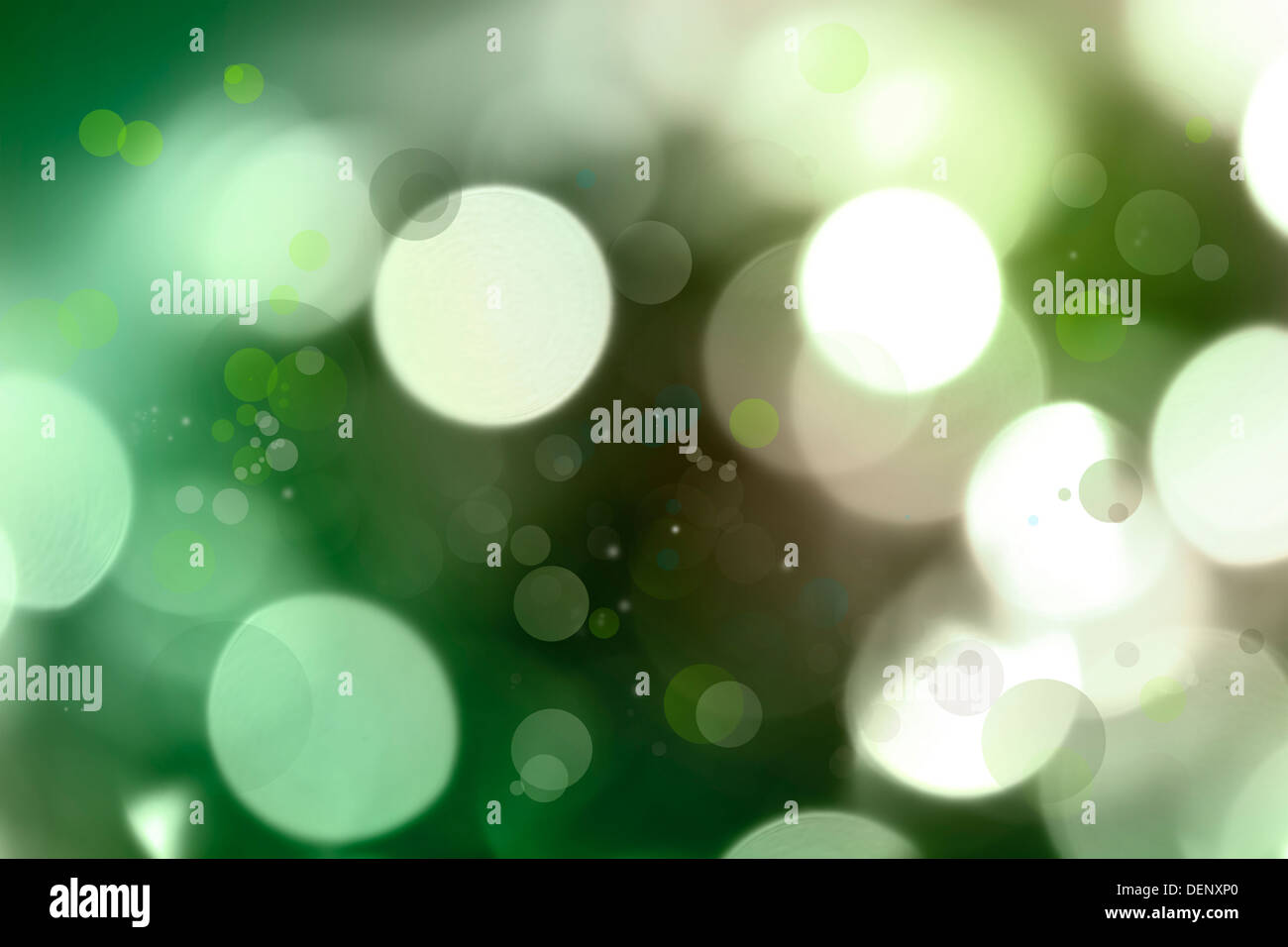 Bright circles of light abstract green background Stock Photo - Alamy