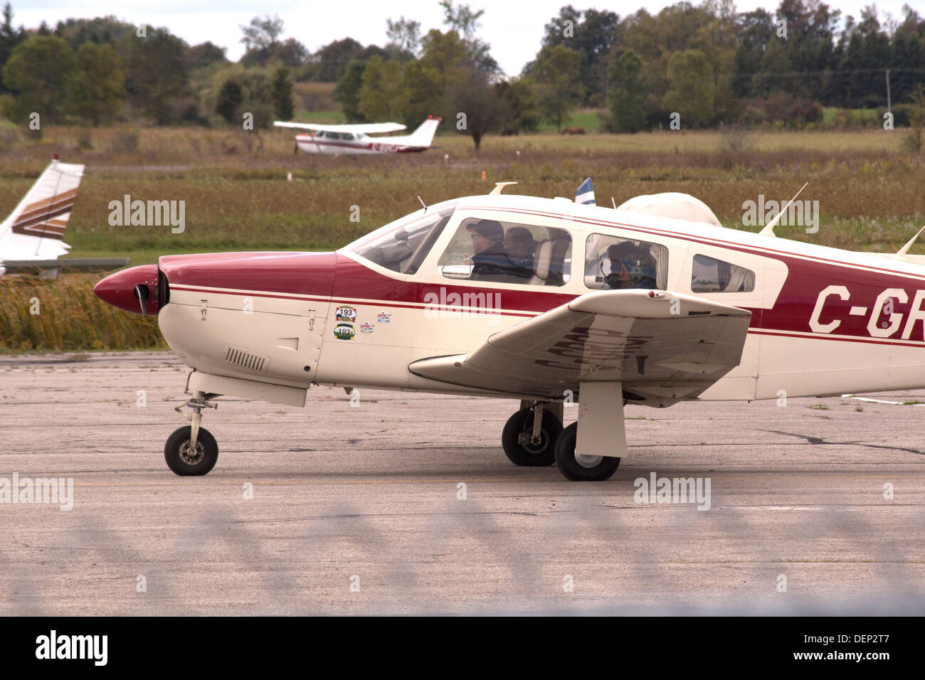 Small plane heading for runway with passengers at Kawartha Lakes Airport in Lindsay, Ontario Stock Photo