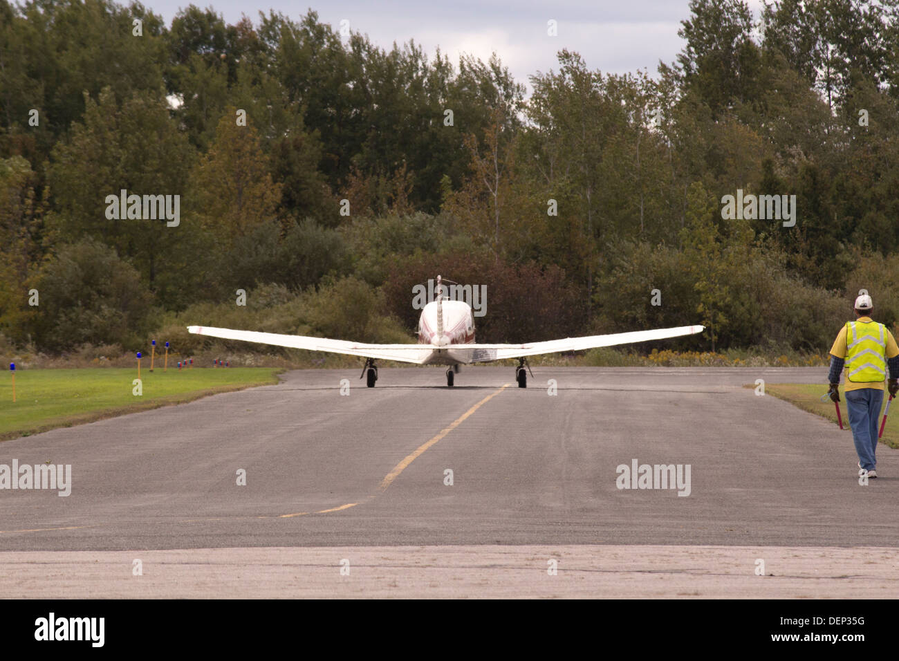 Small plane on runway preparing for takeoff at Kawartha Lakes Airport in Lindsay Ontario Stock Photo