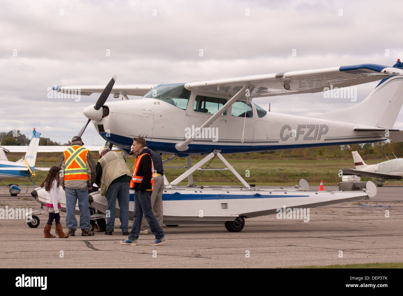Float plane being prepared on tarmac for flight at Kawartha Lakes Airport Stock Photo
