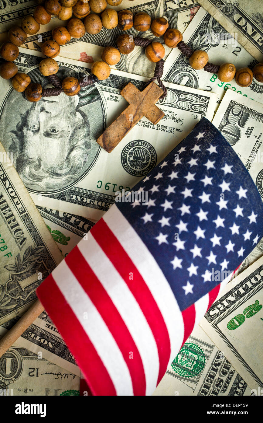 rosary beads with american flag on us dollars background Stock Photo