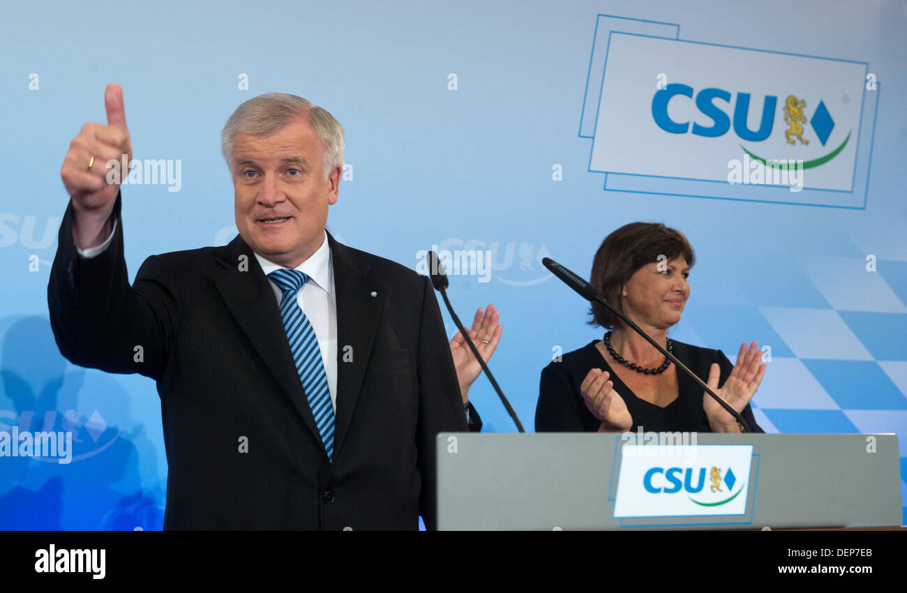 Munich, Germany. 22nd Sep, 2013. Bavarian premier and CSU chairman Horst Seehofer and German agriculture minister Ilse Aigner react to the first results of the 2013 German federal elections in Munich, Germany, 22 September 2013. Photo: PETER KNEFFEL/dpa/Alamy Live News Stock Photo