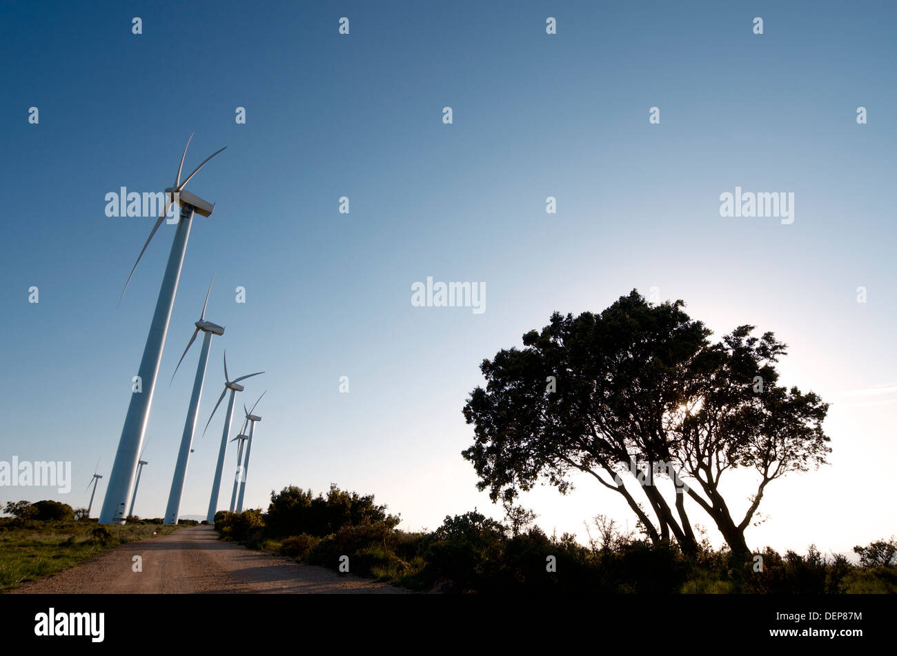 windmills lined up at dusk, El Buste, Saragosa, Aragon, Spain. Stock Photo