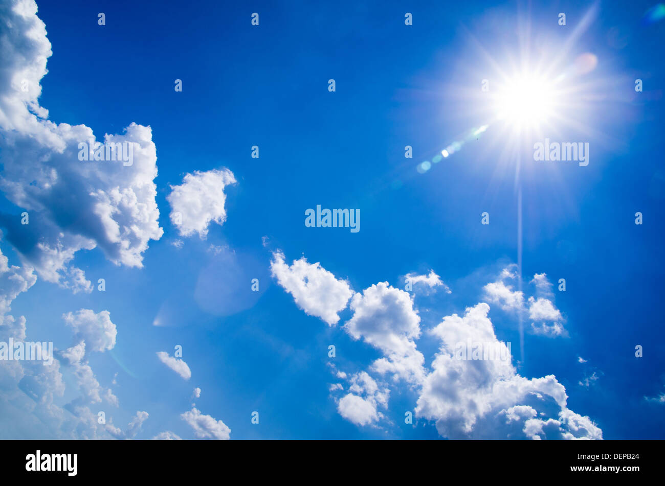 Rainbow in blue sky with white clouds hi-res stock photography and ...